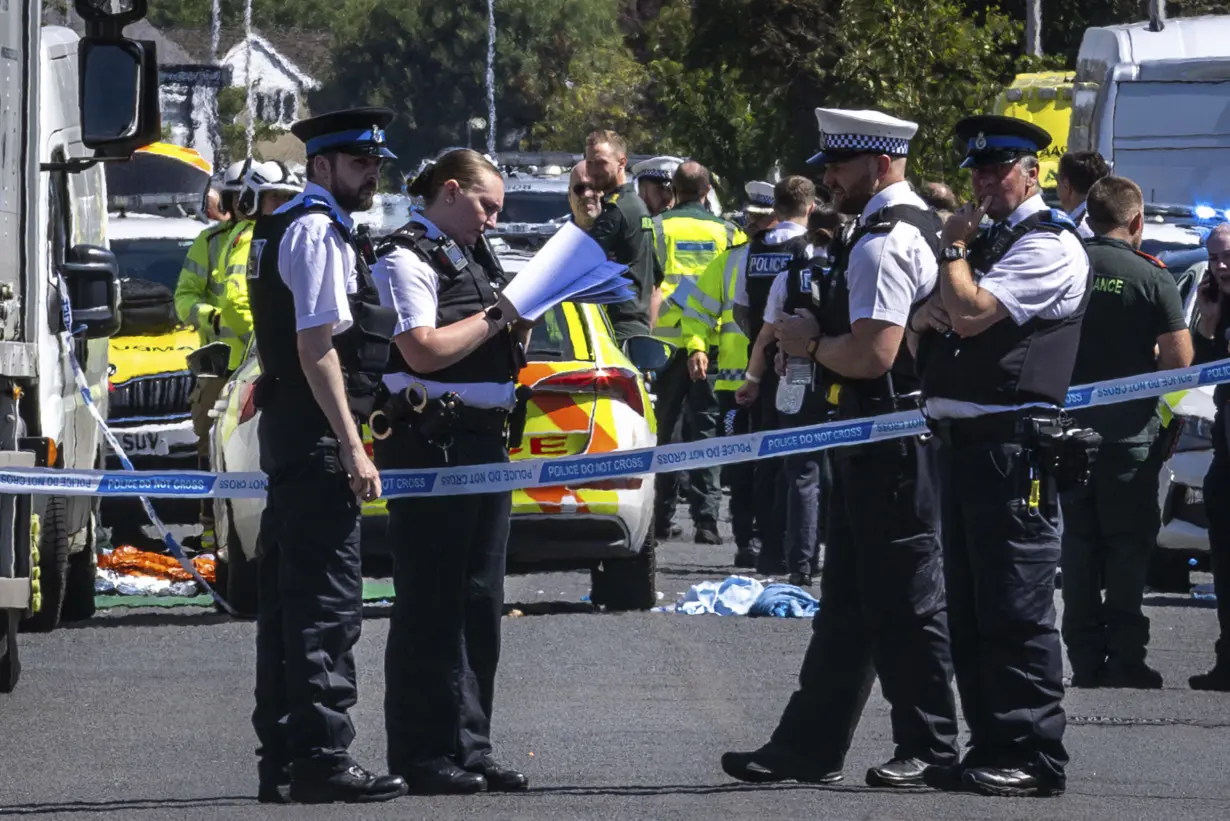 2 children dead and 11 people injured in stabbing rampage at a dance class in England, police say