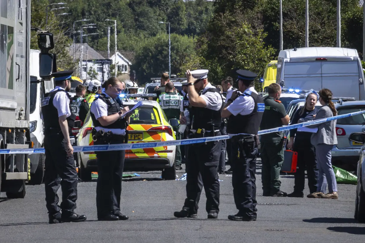 2 children dead and 11 people injured in stabbing rampage at a dance class in England, police say