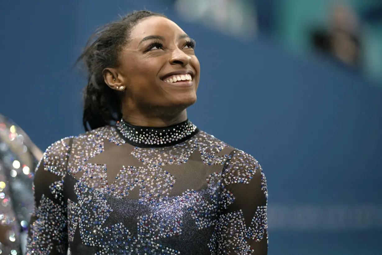 Simone Biles to compete on all four events at Olympic team finals despite calf injury