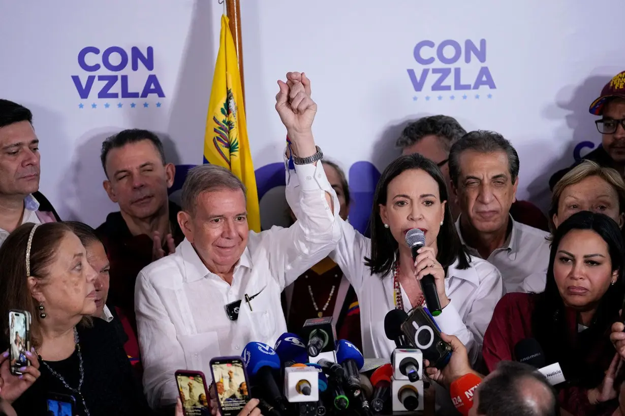 Opposition leader Maria Corina Machado, right, and presidential candidate Edmundo Gonzalez hold a press conference after electoral authorities declared President Nicolas Maduro the winner of the presidential election in Caracas on July 29, 2024.