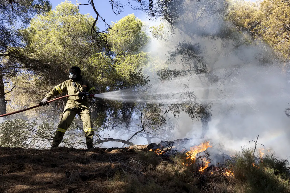 California man defends his home as wildfires push devastation and spread smoke across US West