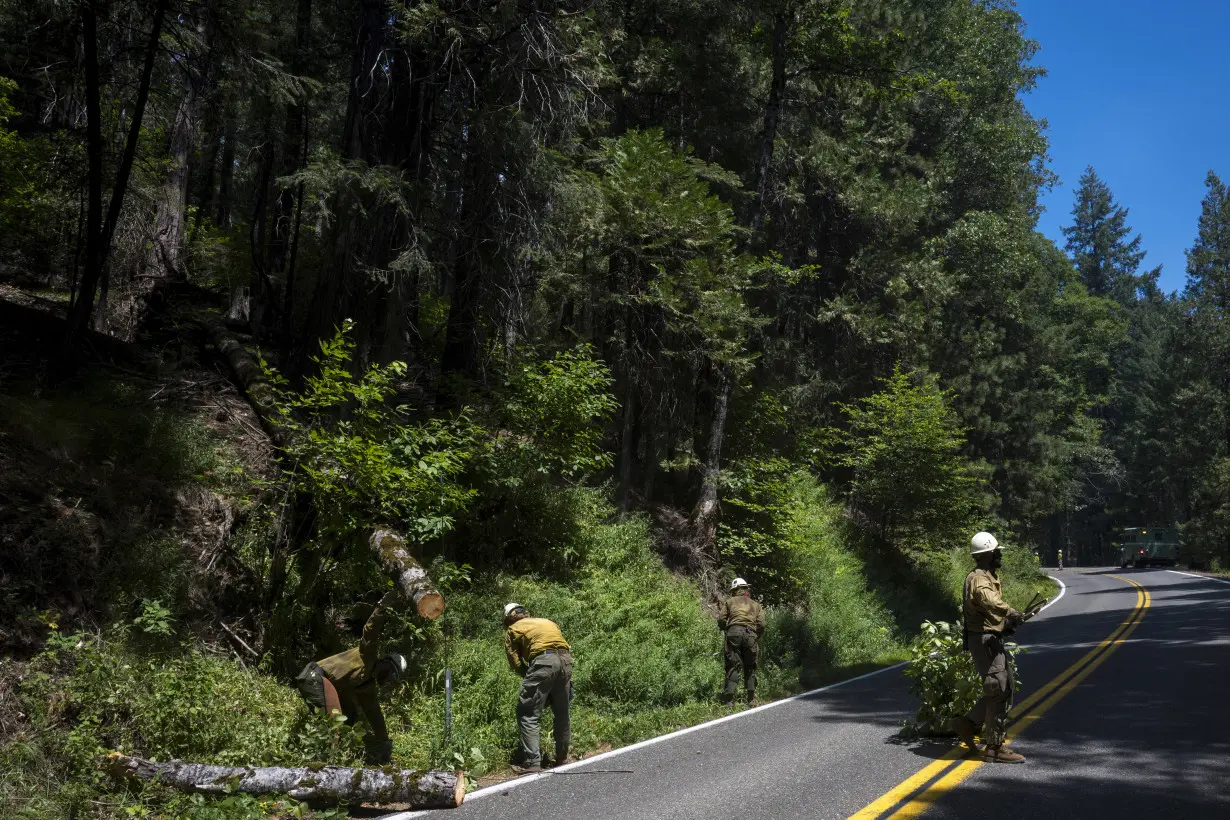 California man defends his home as wildfires push devastation and spread smoke across US West