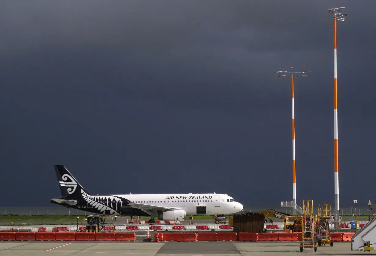 FILE PHOTO: An Air New Zealand Airbus A320 plane sits on the tarmac at Auckland Airport in New Zealand