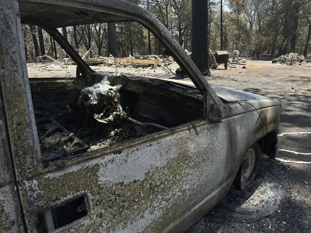 California man defends his home as wildfires push devastation and spread smoke across US West