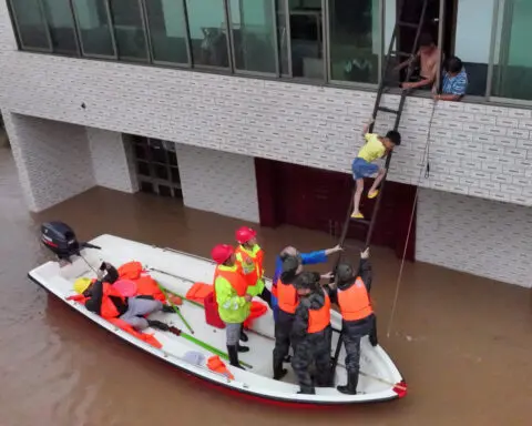 Typhoon remnants kill four in China, sever transport, power links