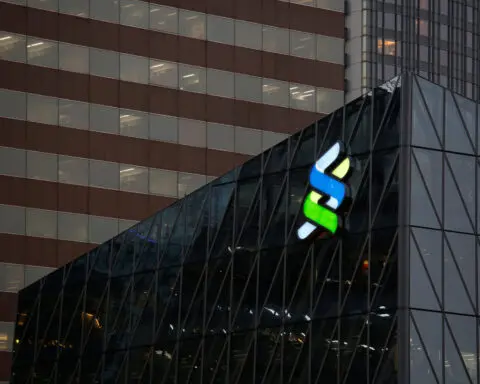 StanChart unveils record $1.5 billion buyback, boosts income outlook