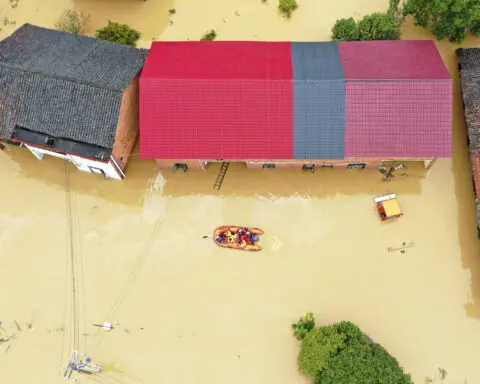 China reports 7 more deaths from torrential rains brought by tropical storm, raising toll to 22