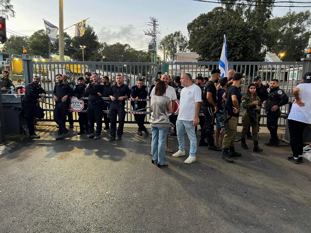 FILE PHOTO: Protesters gather at a military base, after Israeli military police opened an investigation into the suspected abuse of a Palestinian detainee, in Netanya