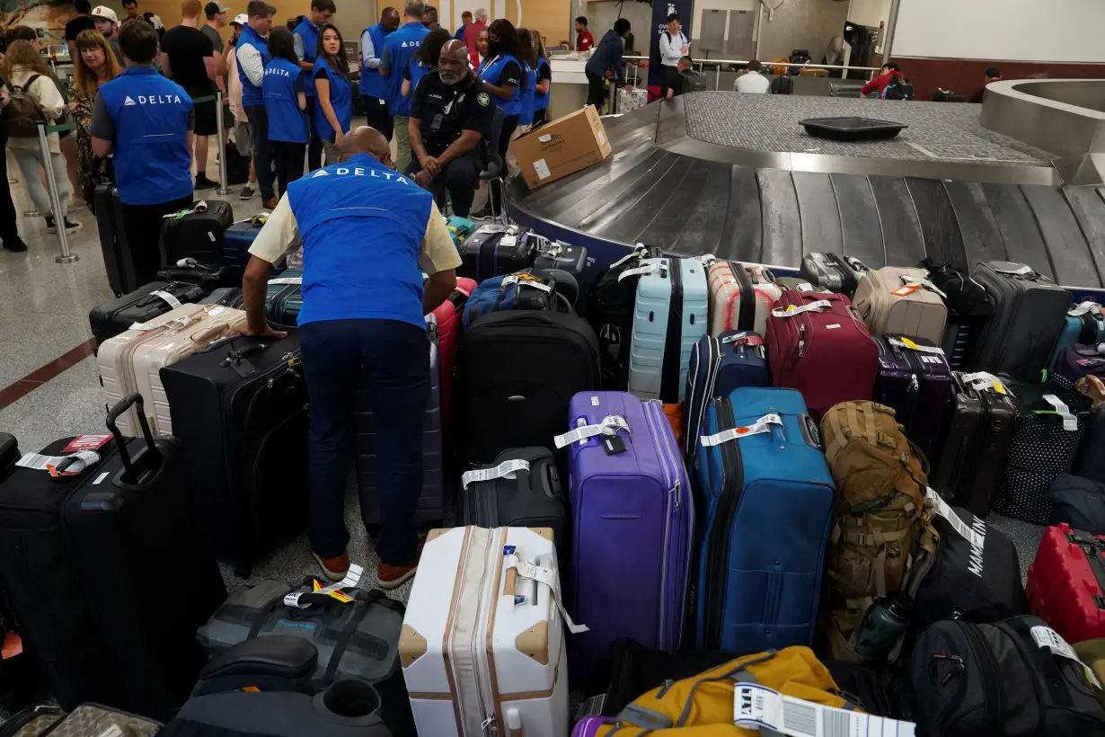 FILE PHOTO: Lines remain at airports after cyber outage, in Atlanta