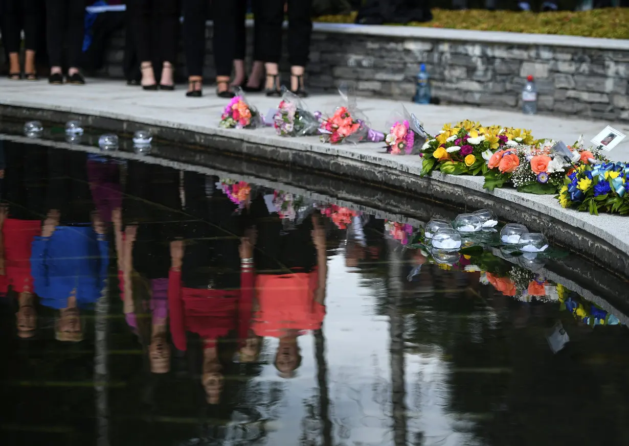 Friends, relatives and victims commemorate the 20th anniversary of the IRA Omagh bombing at a ceremony in the Memorial Garden in Omagh