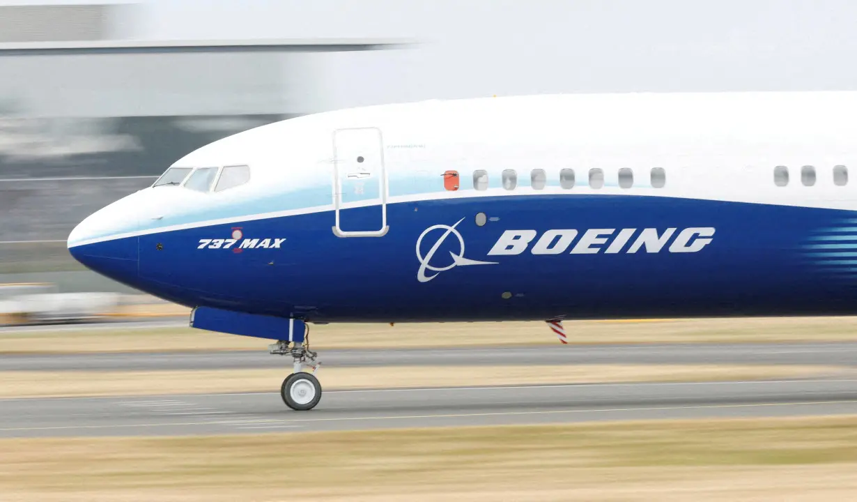 FILE PHOTO: A Boeing 737 Max aircraft during a display at the Farnborough International Airshow, in Farnborough