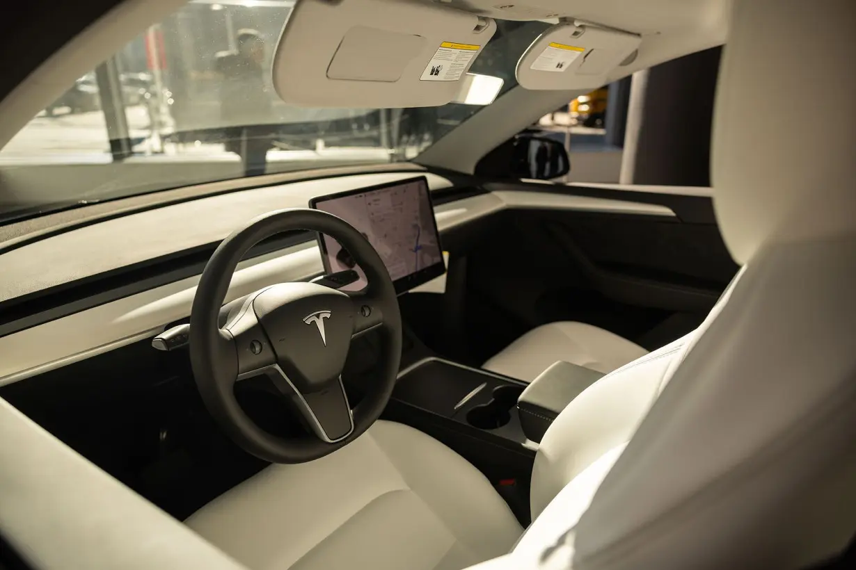 The interior of a Tesla Model Y electric vehicle at the company's showroom in New York.