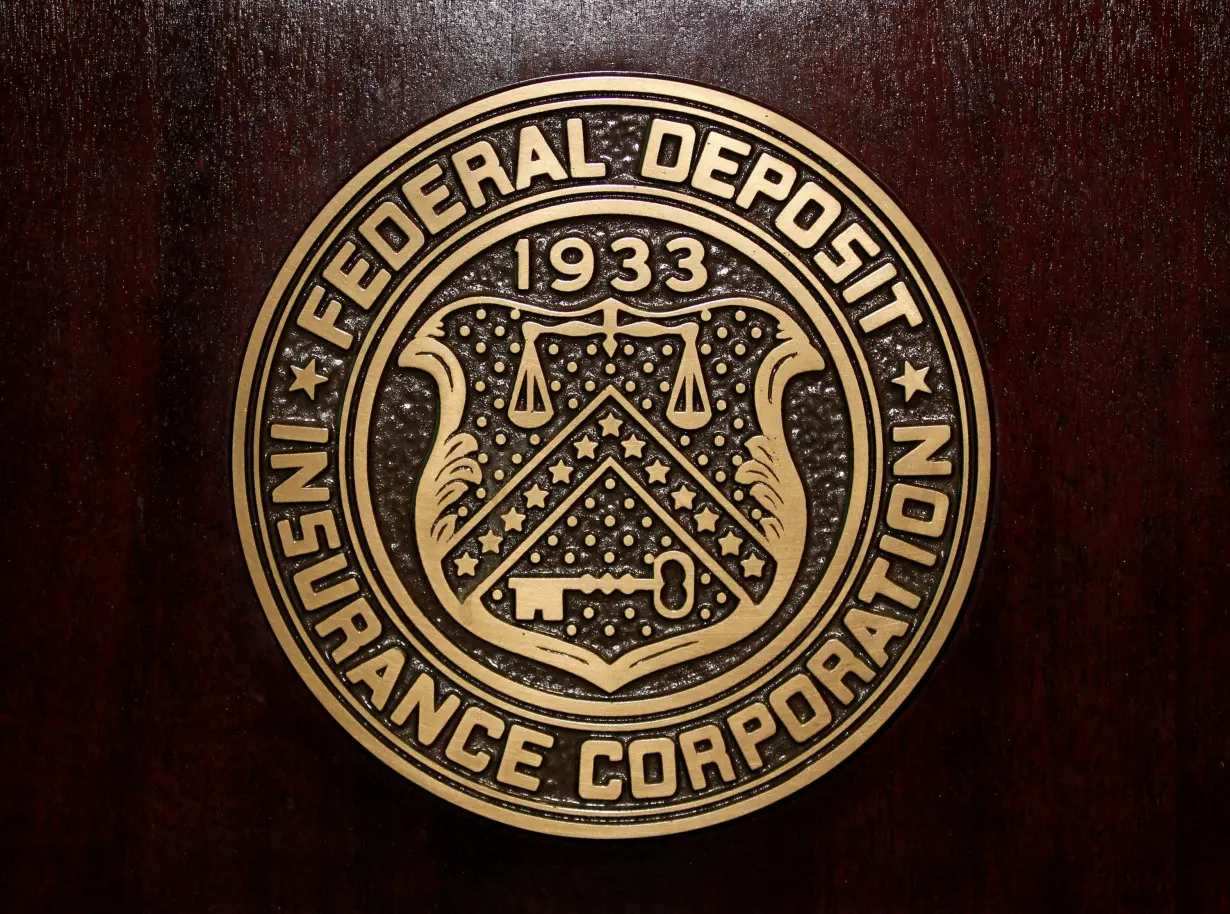 FILE PHOTO: The Federal Deposit Insurance Corp (FDIC) logo is seen at the FDIC headquarters in Washington