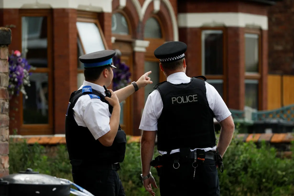 Scene where a man was arrested after at least eight people were stabbed in Southport, Britain