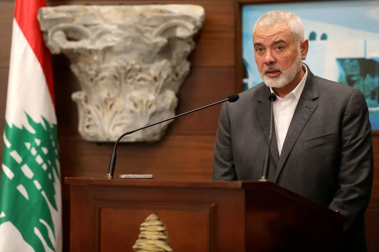 FILE PHOTO: Palestinian group Hamas' top leader Ismail Haniyeh talks after meeting with Lebanon's President Michel Aoun, in Baabda