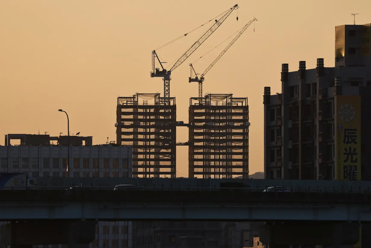 FILE PHOTO: A construction site is seen at sunset in Taipei