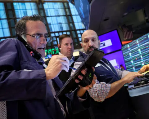 S&P 500, Nasdaq boosted by chip rally, Fed rate cut signals