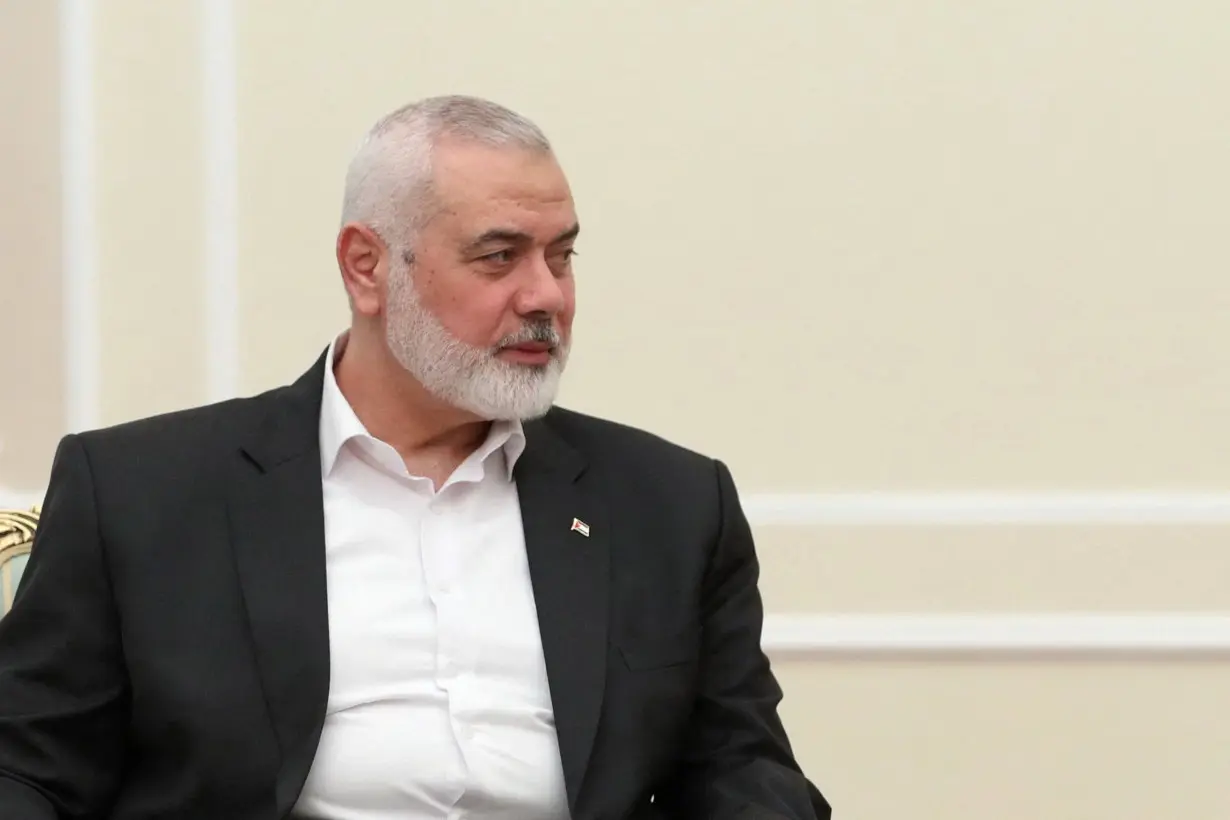 Palestinian group Hamas' top leader Ismail Haniyeh meets with Iranian President Masoud Pezeshkian in Tehran