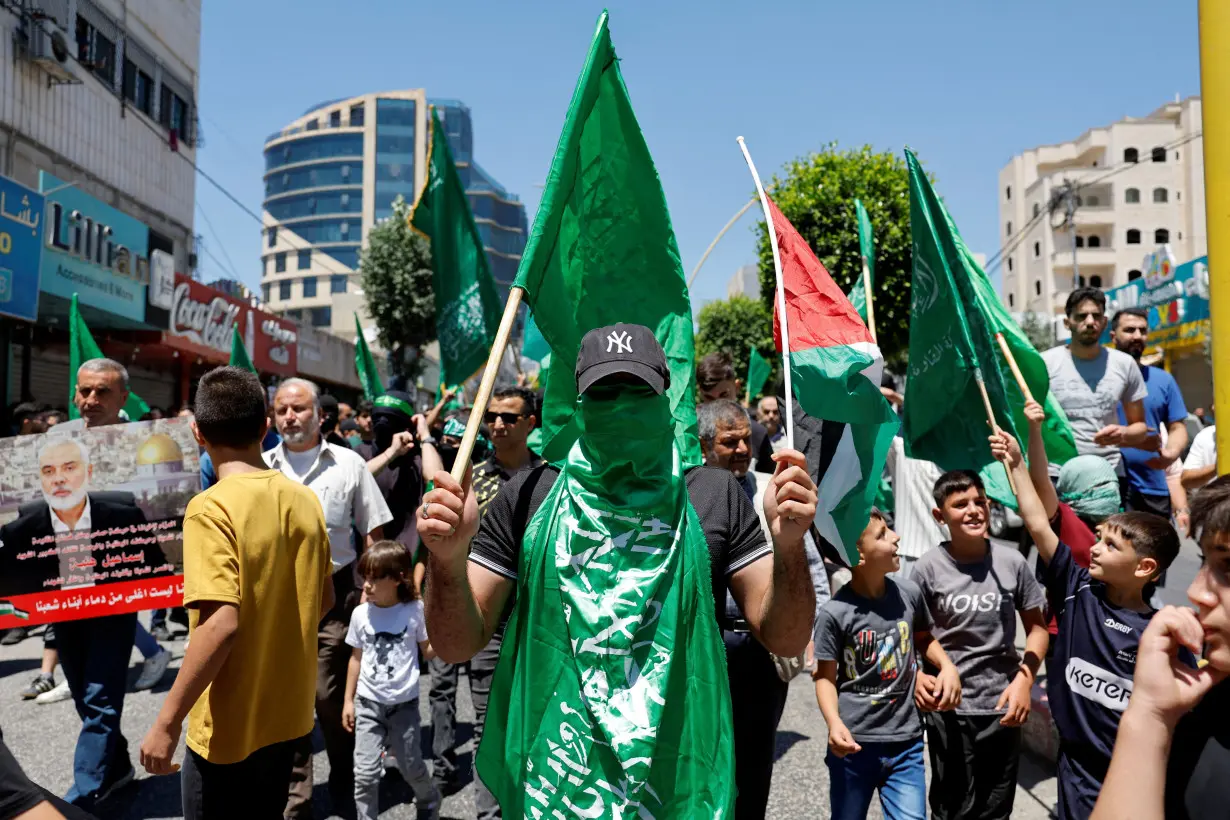 Palestinians protest after the assassination of Hamas leader Ismail Haniyeh in Iran, in Hebron