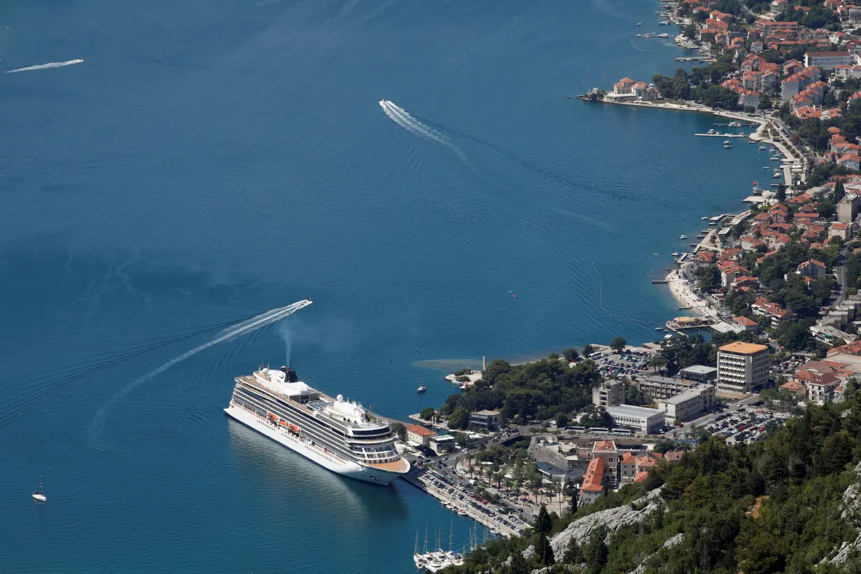 FILE PHOTO: Norwegian mega cruise ship docked in front of Old Town of Kotor