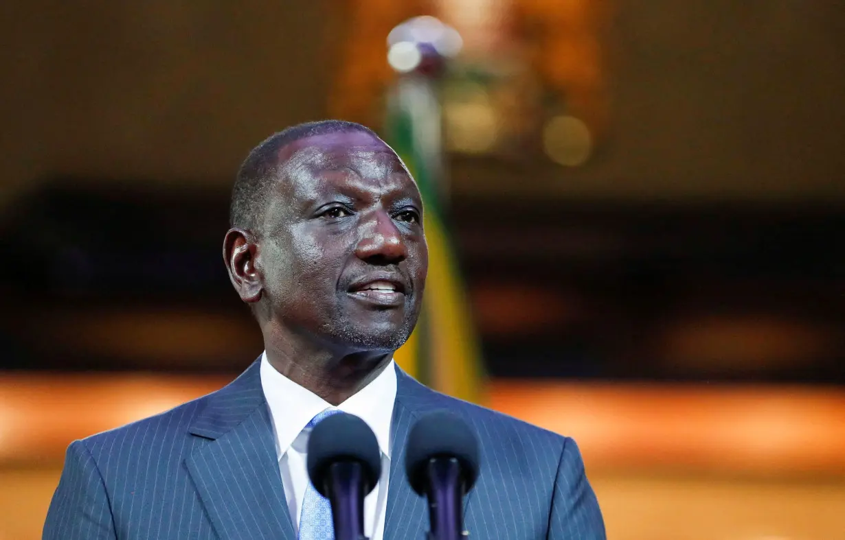 FILE PHOTO: Kenya's President William Ruto signs the Independent Electoral and Boundaries Commission Amendment Bill 2024, in Nairobi