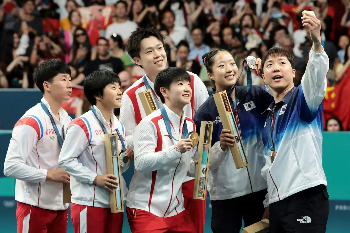 Why this podium selfie with North and South Korean athletes at the Olympics is so striking