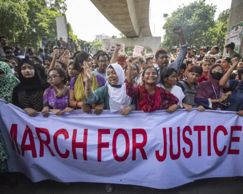 Bangladesh mourns some 200 deaths as student protests wind down and thousands are arrested