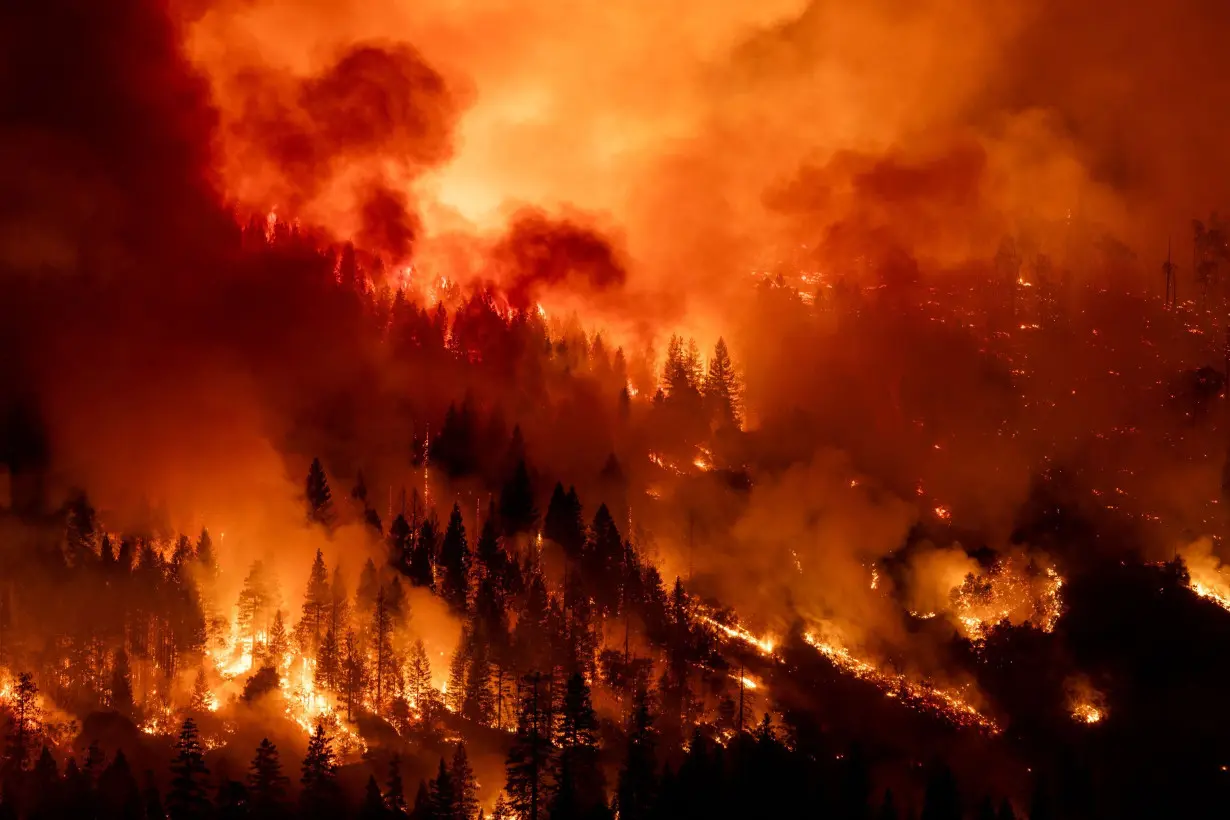 Hundreds of homes are evacuated due to wildfire near Denver as California's Park Fire torches an area larger than Los Angeles