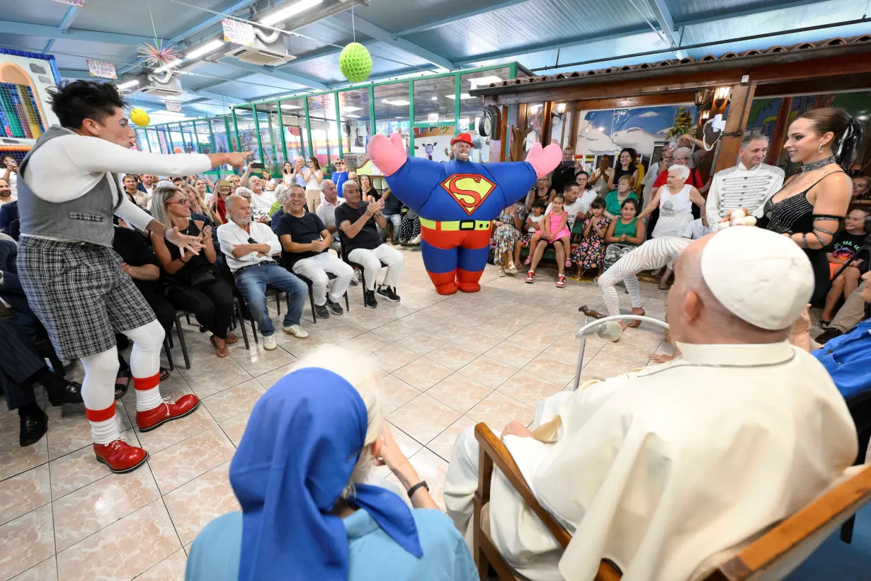 Pope Francis meets Sister Genevieve Jeanningros and the Community of carousers and circus performers at the Luna Park in Ostia Lido