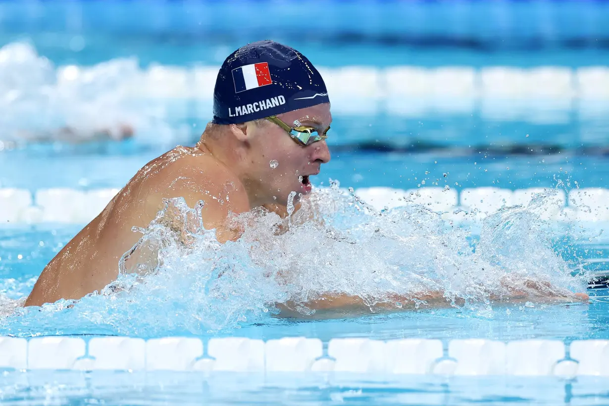 Marchand swam an incredible 200m breaststroke to sweep the French crowd off its feet.