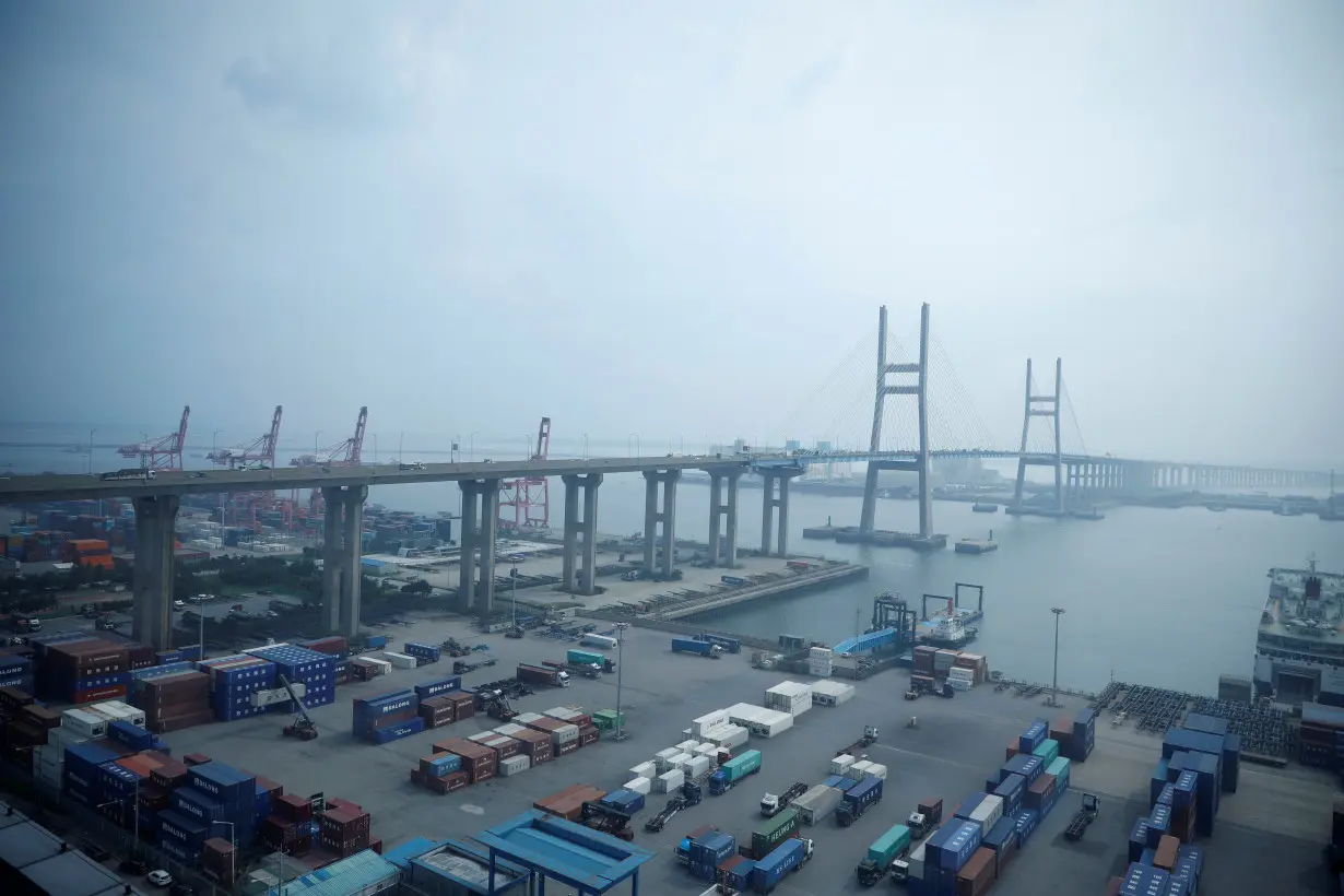 Cranes and shipping containers are seen at Pyeongtaek port in Pyeongtaek