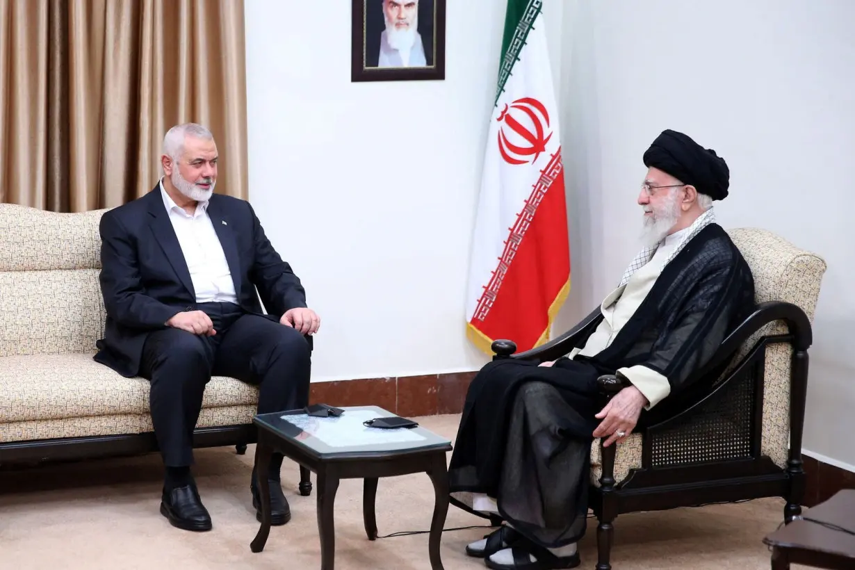 Iran's Supreme Leader Ayatollah Ali Khamenei meets with Palestinian group Hamas' top leader Ismail Haniyeh in Tehran