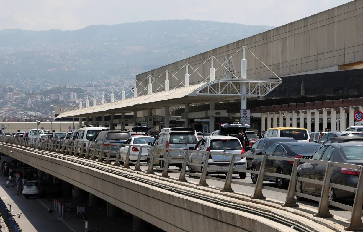 FILE PHOTO: Cars queue as they drop passengers outside the Beirut–Rafic Hariri International Airport