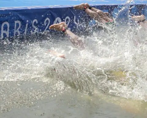 Olympic triathletes swim in Seine River after days of concerns about water quality