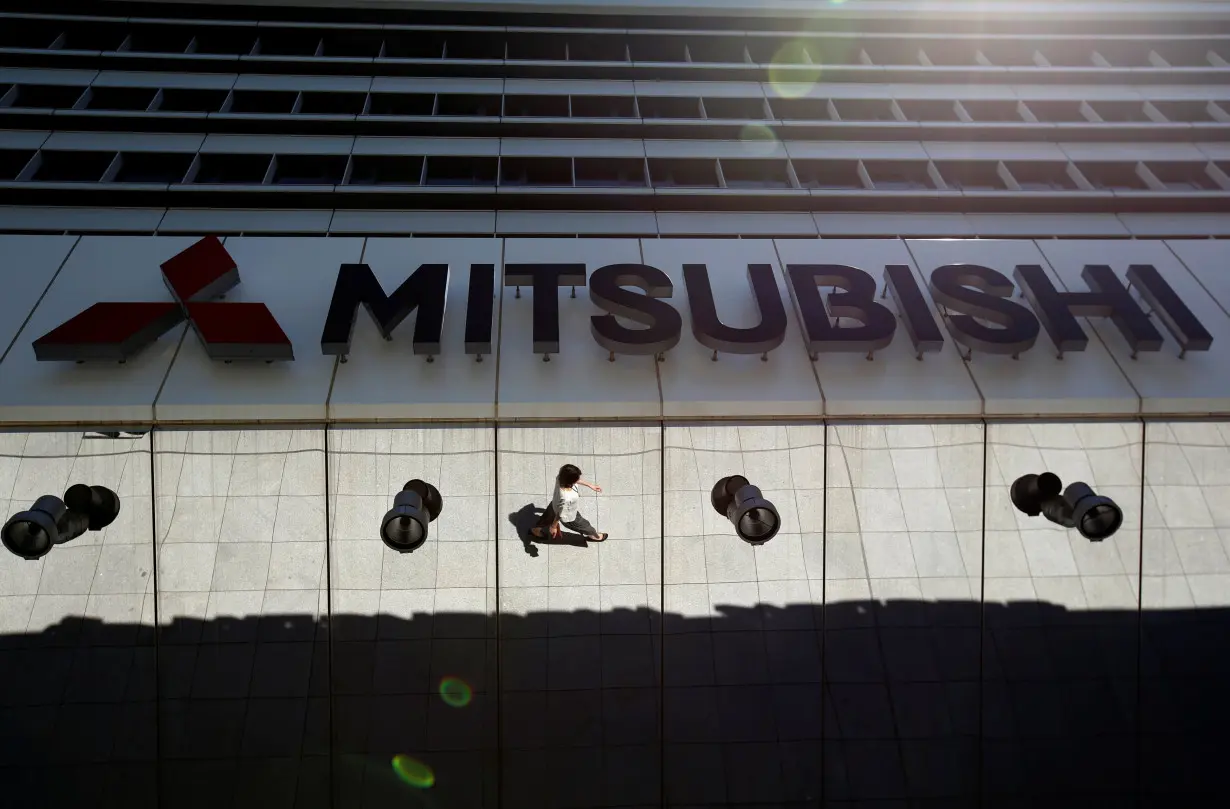 The company logo of Mitsubishi Motors is seen at its headquarters in Tokyo, Japan