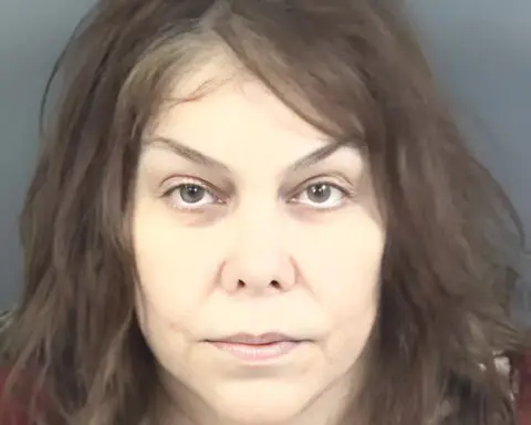 Adoptive mother accused of killing children and forcing sibling to dismember bodies