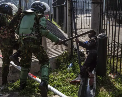 Anti-tax protesters storm Kenya's parliament, drawing police fire as president vows to quash unrest