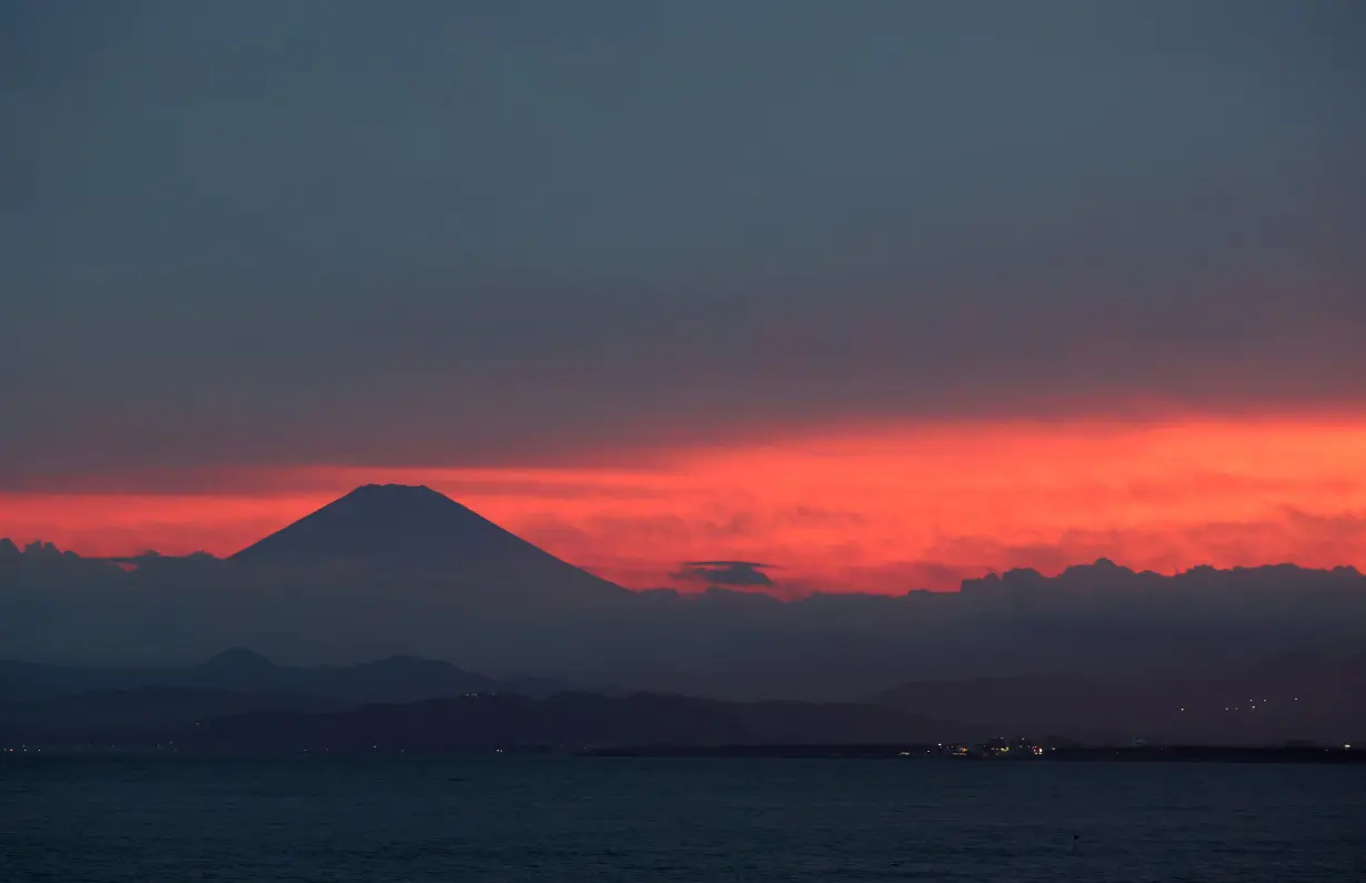 FILE PHOTO: Mount Fuji is seen from Enoshima island, in Fujisawa, south of Tokyo