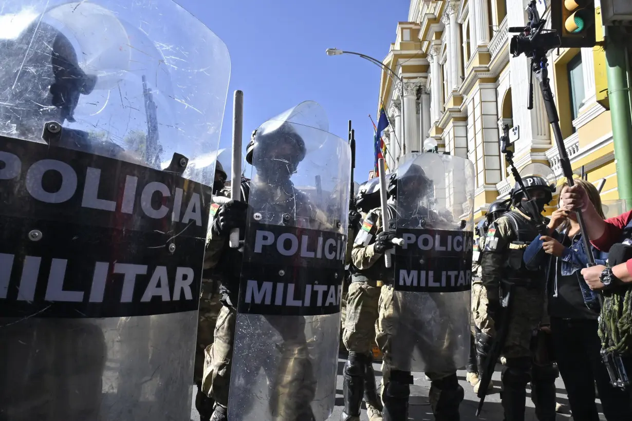 Military troops stand outside the Quemado Palace at the Plaza de Armas in La Paz, Bolivia, on June 26.