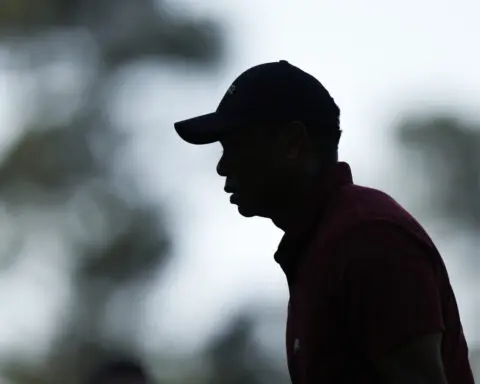 Tiger Woods on the course for 100th round at the Masters after getting swing tips from son Charlie