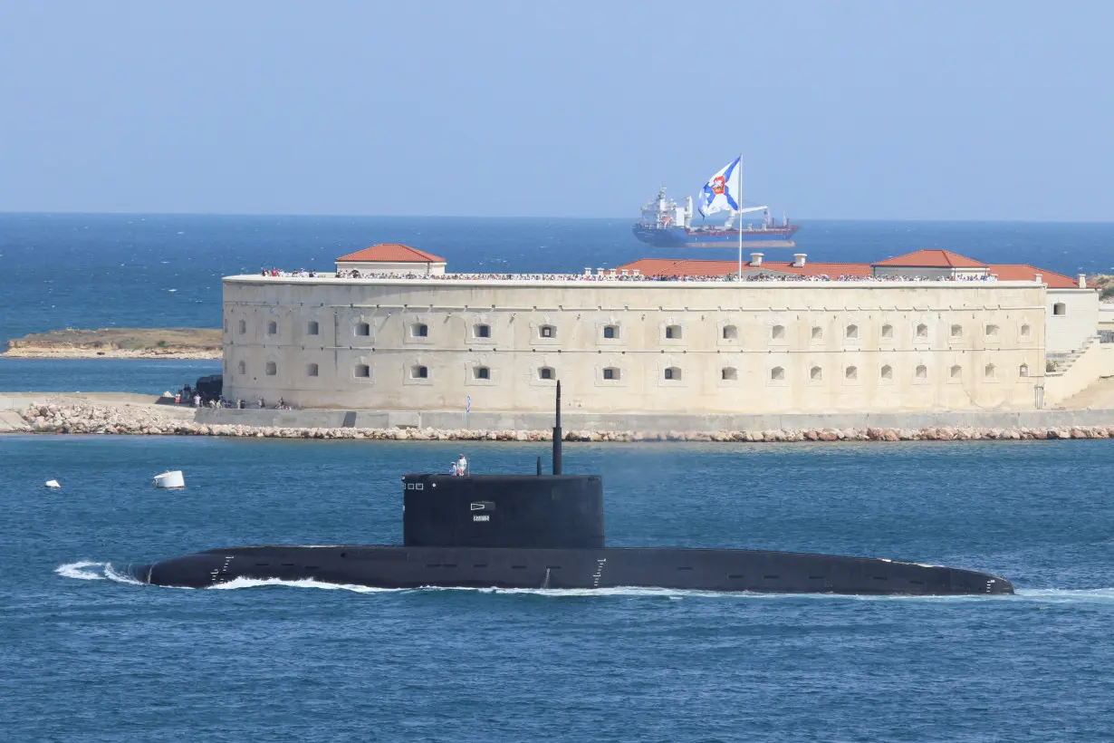 FILE PHOTO: The Russian Navy's improved kilo-class submarine Kolpino sails during the Navy Day parade in Sevastopol