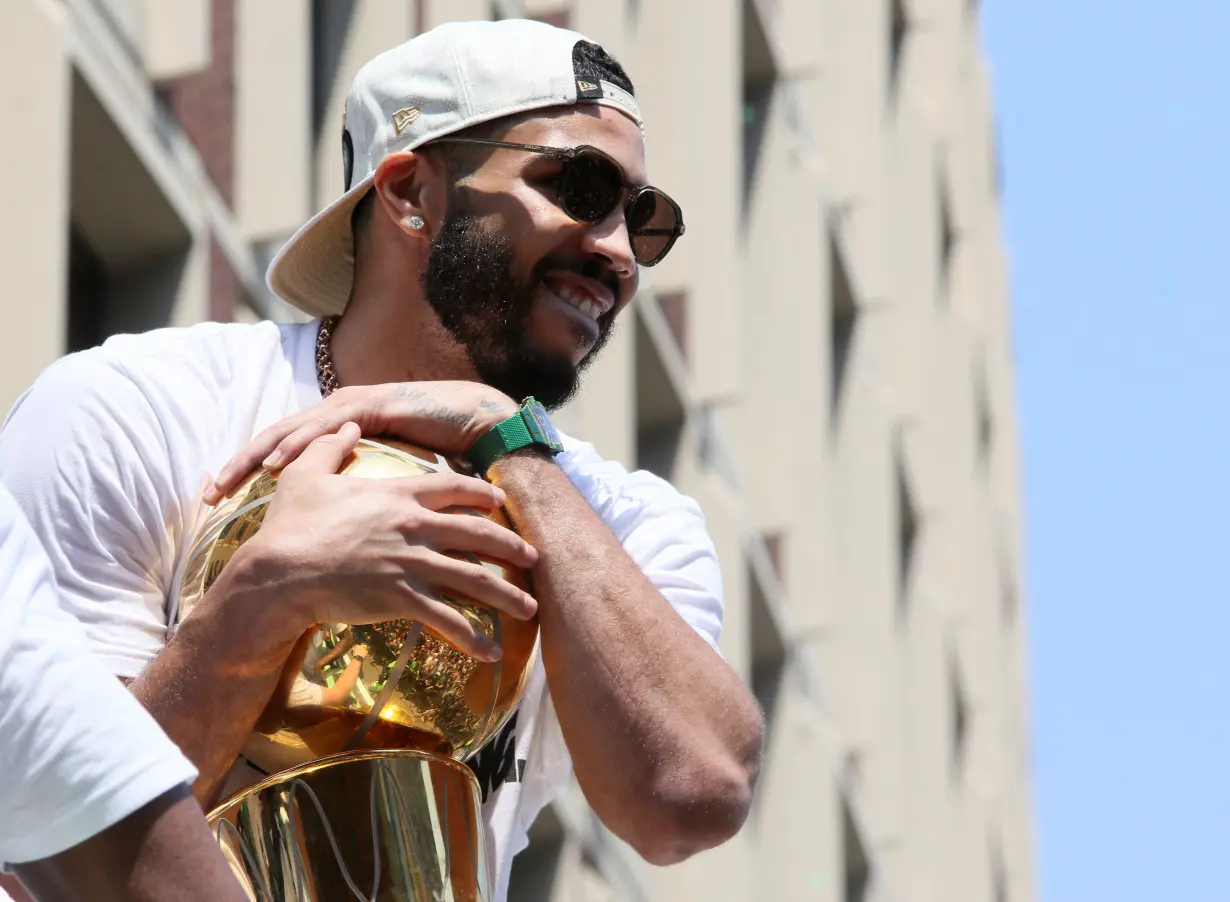 The Boston Celtics hold a parade to celebrate their 18th NBA Championship
