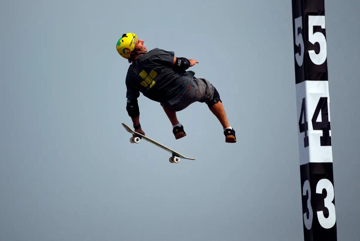 FILE PHOTO: Skateboarder Andy Macdonald performs at the SKB Mini-Mega final during the World Extreme Games in Shanghai