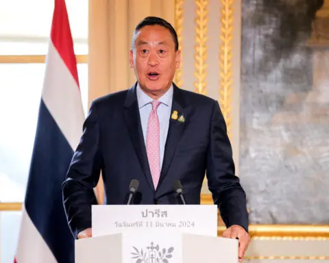 Thailand's flagship $14 billion handout scheme suffers early snags as millions rush to register