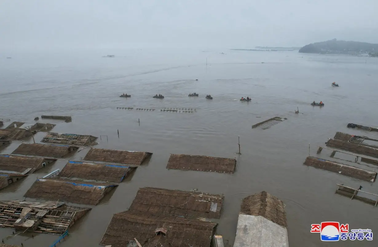 North Korean leader Kim Jong Un visits a flood-affected area near the border with China, in North Pyongan Province