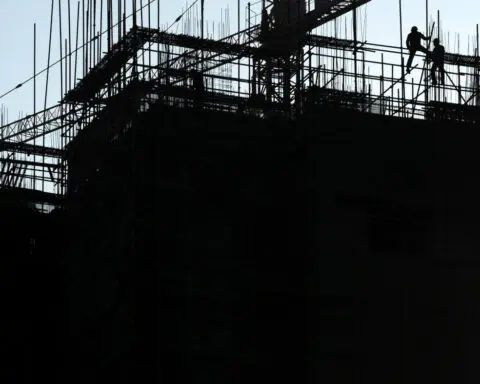 China developer returns buyers' deposits for unfinished homes, local media says