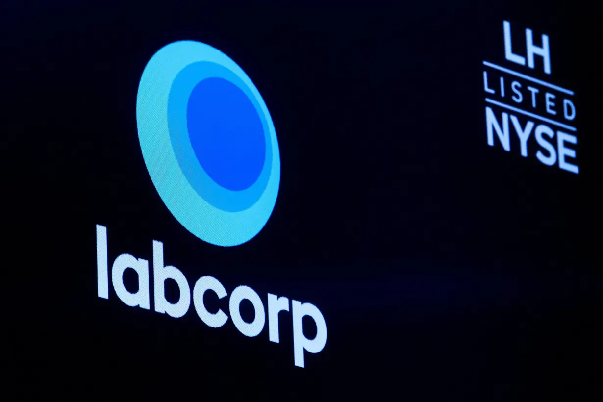 The logo for Labcorp is displayed on a screen on the floor of the NYSE in New York