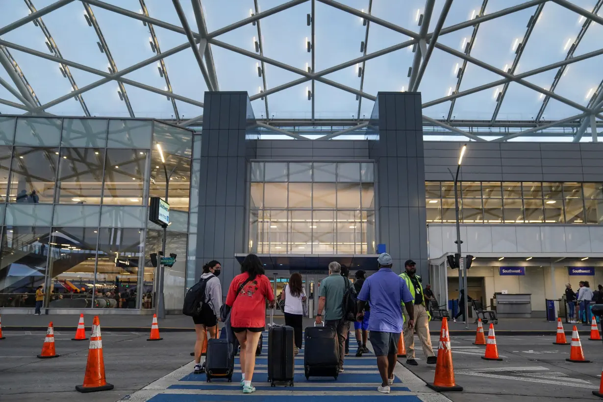 Passengers line up before their flights at Hartsfield-Jackson Atlanta International Airport