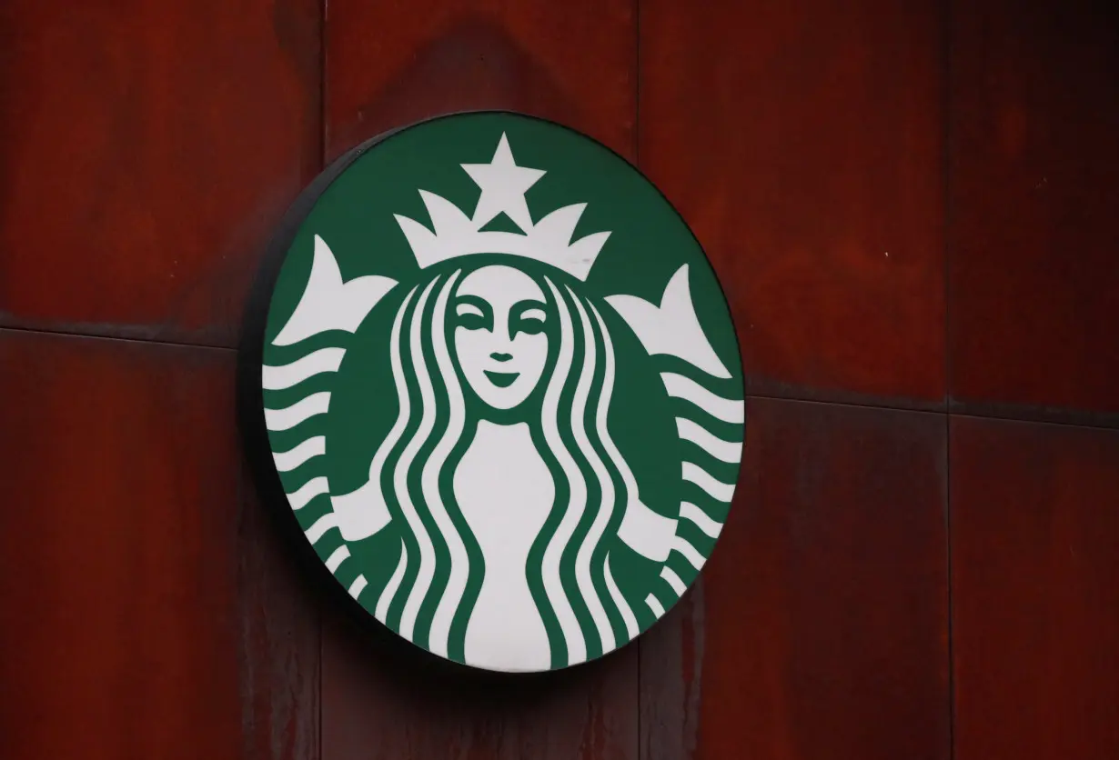 The logo of the American coffee company, Starbucks, in Mexico City