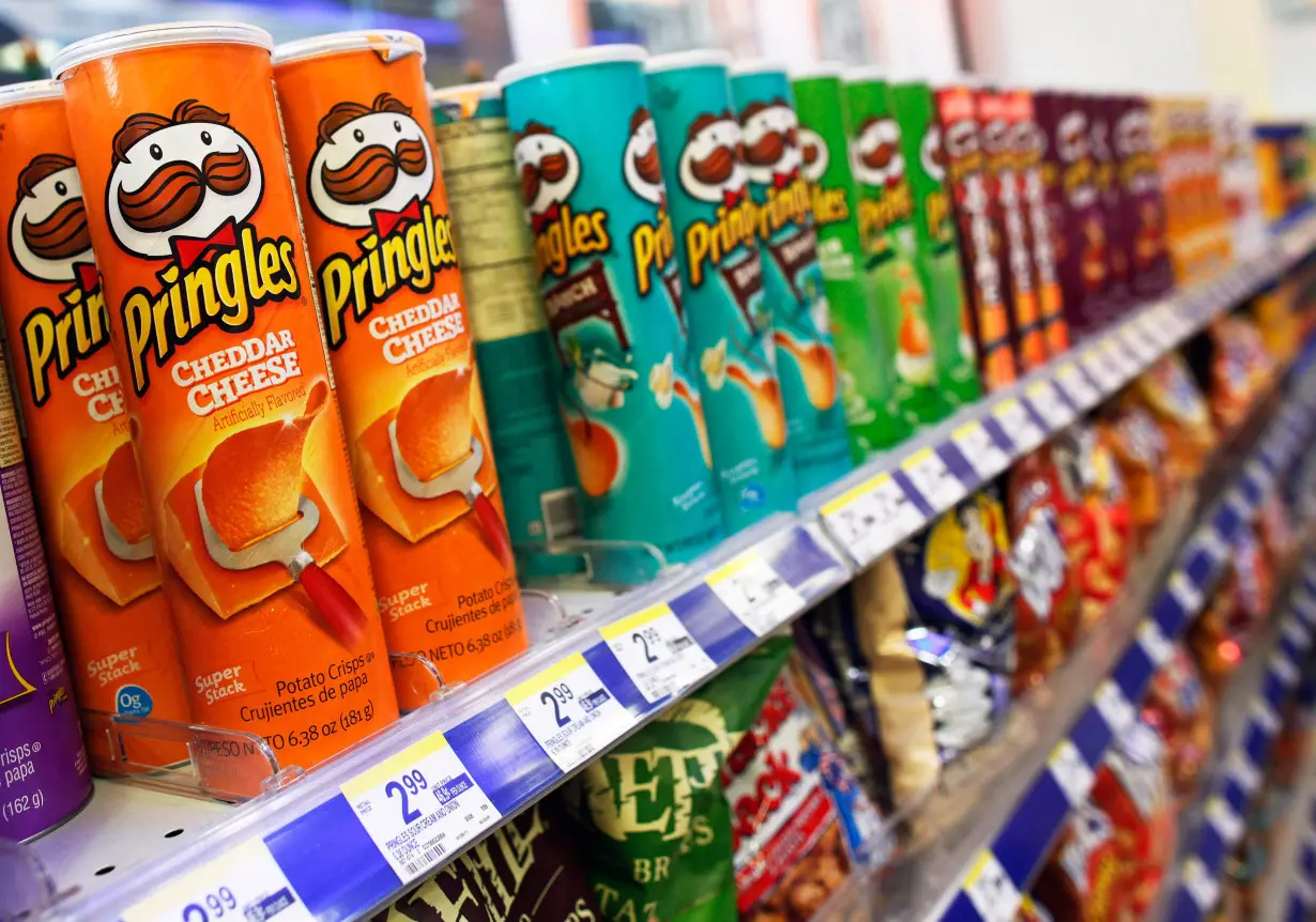 Cans of Pringles are seen on display in New York